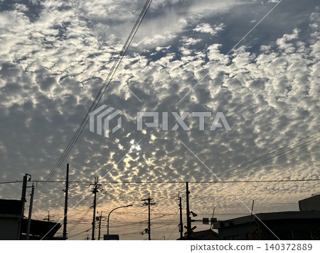 Scallop cloud sunset Scallop cloud sunset 140372889
