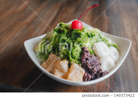Japanese-style matcha shaved ice at a summer coffee shop Japanese-style matcha shaved ice at a summer coffee shop 140373422