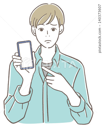 A man with a troubled expression points to his cell phone screen. 140373607