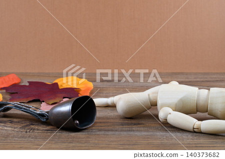 The bear bell and the fallen doll create an image of being attacked by a bear. The bear bell and the fallen doll create an image of being attacked by a bear. 140373682