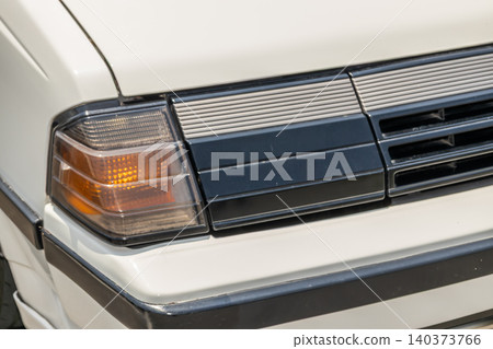 Headlight of the old car 140373766