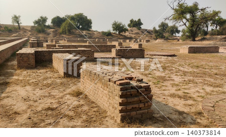 Harappan archaeological site Pakistan showing ancient civilization with preserved artifacts and settlement layers Harappan archaeological site Pakistan showing ancient civilization with preserved artifacts and settlement layers 140373814