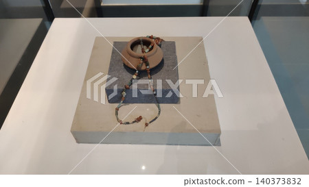Harappan bead necklace and pottery bowl revealing culture of Indus Valley civilization Pakistan Harappan bead necklace and pottery bowl revealing culture of Indus Valley civilization Pakistan 140373832