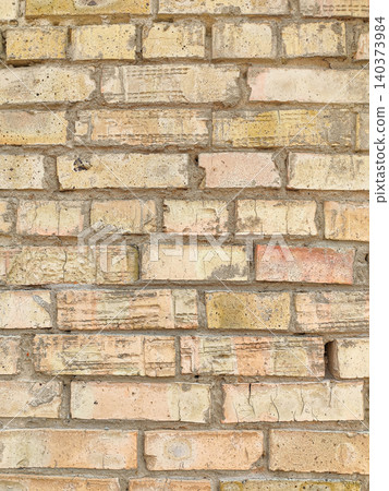 Texture of Weathered Antique Brick Wall with Yellow and Pinkish Blocks Texture of Weathered Antique Brick Wall with Yellow and Pinkish Blocks 140373984