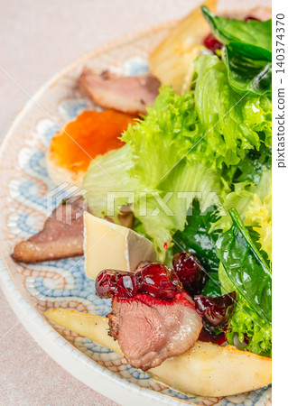 Fresh Green Salad with Duck Breast Pear and Cranberry Sauce Fresh Green Salad with Duck Breast Pear and Cranberry Sauce 140374370