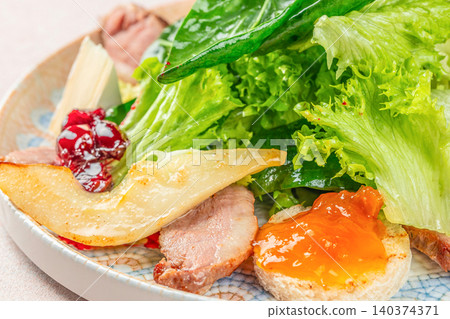 Duck Breast Salad with Pear Cranberry Sauce and Fresh Greens Close Up Duck Breast Salad with Pear Cranberry Sauce and Fresh Greens Close Up 140374371