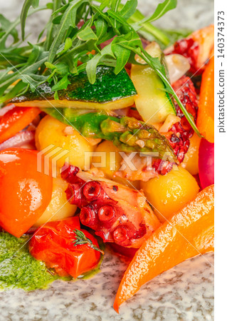 Mediterranean Octopus Salad with Vegetables and Pesto Close Up Mediterranean Octopus Salad with Vegetables and Pesto Close Up 140374373