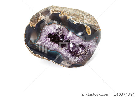 Amethyst Crystal Druse macro mineral on white background Amethyst Crystal Druse macro mineral on white background 140374384