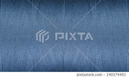 Close-up texture of Blue sewing threads on a spool Close-up texture of Blue sewing threads on a spool 140374401
