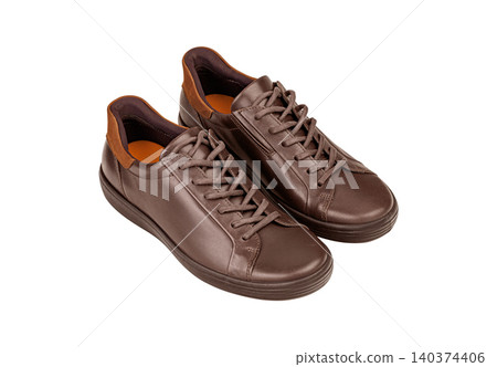 Pair of men's brown leather sneakers isolated on white background Pair of men's brown leather sneakers isolated on white background 140374406