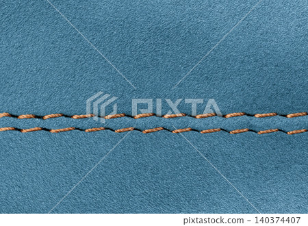Professional double seam on Blue suede leather garment close-up Professional double seam on Blue suede leather garment close-up 140374407
