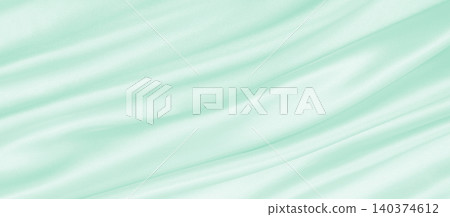Smooth elegant green silk or satin luxury cloth texture as abstract background. Luxurious background design Smooth elegant green silk or satin luxury cloth texture as abstract background. Luxurious background design 140374612