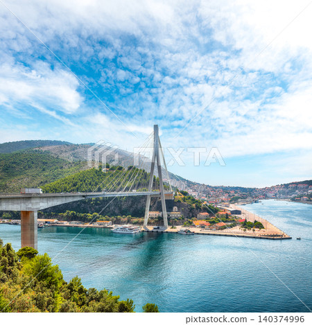 Amazing panorama of Franjo Tudjman bridge and blue lagoon with harbor of Dubrovnik 140374996