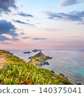 Amazing sunset over Torra di a Parata with Genoese Tower and Archipelago of Sanguinaires islands at background. 140375041
