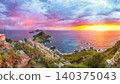 Amazing sunset over Torra di a Parata with Genoese Tower and Archipelago of Sanguinaires islands at background. 140375043