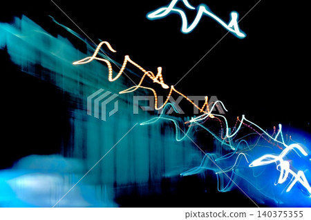 Neon abstract background with blue light and bird-like trails of light. Neon abstract background with blue light and bird-like trails of light. 140375355
