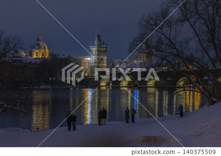 Charles Bridge and Vltava River in winter evening Prague Charles Bridge and Vltava River in winter evening Prague 140375509