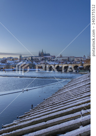 Prague Castle and Charles Bridge in winter snowing Prague Castle and Charles Bridge in winter snowing 140375512