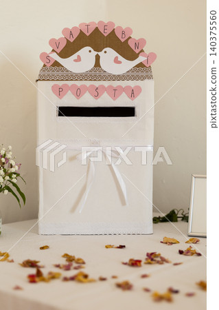 White wedding post box with kissing doves illustration White wedding post box with kissing doves illustration 140375560