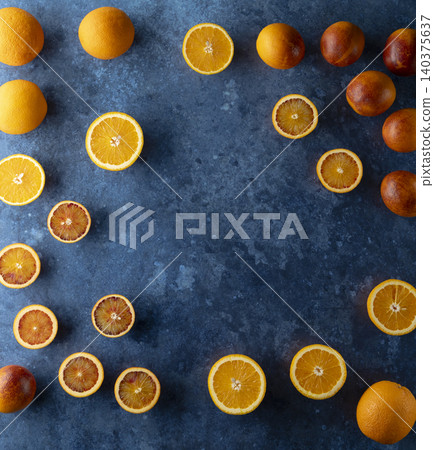 Fresh citrus fruits and blood oranges on blue background 140375637