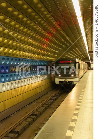 Subway train arriving at NAMESTI MIRU station in Prague Subway train arriving at NAMESTI MIRU station in Prague 140375696