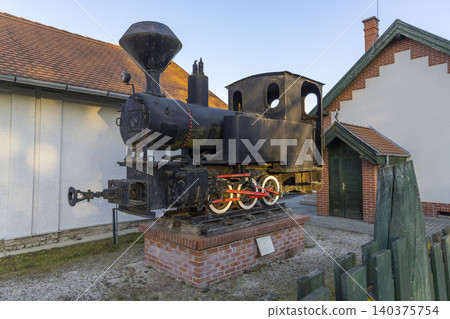 Old steam locomotive train standing in Lenti, Hungary Old steam locomotive train standing in Lenti, Hungary 140375754