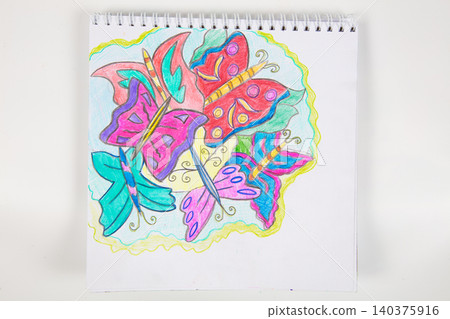 Colorful butterflies adorn a sketchbook page in bright hues during an art session Colorful butterflies adorn a sketchbook page in bright hues during an art session 140375916