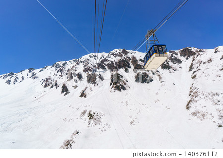 The Tateyama Ropeway, connecting Daikanbo and Kurobe-daira on the Tateyama Kurobe Alpine Route, and a snowy landscape. The Tateyama Ropeway, connecting Daikanbo and Kurobe-daira on the Tateyama Kurobe Alpine Route, and a snowy landscape. 140376112