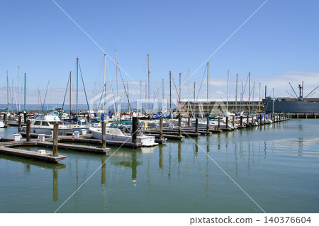 Sailboat marina with reflections on calm water in San Francisco Bay Sailboat marina with reflections on calm water in San Francisco Bay 140376604