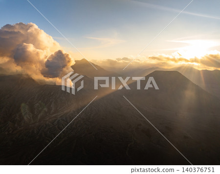 Amazing Mount Bromo volcano during sunrise from king kong viewpoint on Mountain Penanjakan in Bromo Tengger Semeru National Park,East Java,Indonesia.Nature landscape background Amazing Mount Bromo volcano during sunrise from king kong viewpoint on Mountain Penanjakan in Bromo Tengger Semeru National Park,East Java,Indonesia.Nature landscape background 140376751