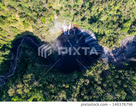 Aerial view of the Tumpak Sewu Waterfalls also known as Coban Sewu.Beautiful Tumpak Sewu Waterfalls are a tourist attraction in East Java, Indonesia.Amazing travel destination in asia 140376796