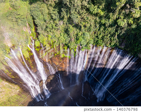 Aerial view of the Tumpak Sewu Waterfalls also known as Coban Sewu.Beautiful Tumpak Sewu Waterfalls are a tourist attraction in East Java, Indonesia.Amazing travel destination in asia 140376798