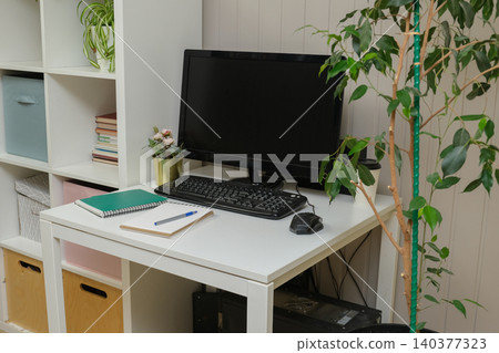Orderly workspace setup. Organized desk, work from home concept. Remote office station with laptop display, keyboard, paperwork. Work place for distance working. Tidy table with monitor and printer Orderly workspace setup. Organized desk, work from home concept. Remote office station with laptop display, keyboard, paperwork. Work place for distance working. Tidy table with monitor and printer 140377323