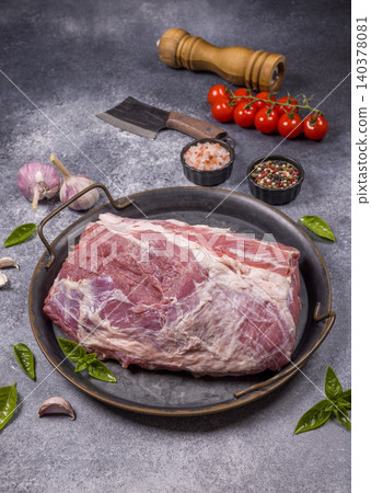 Raw pork shoulder for cooking with spices and herbs Raw pork shoulder for cooking with spices and herbs 140378081