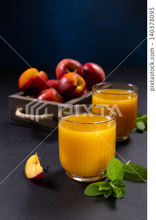 Fresh nectarine juice invigorating summer refreshment drink Fresh nectarine juice invigorating summer refreshment drink 140378095