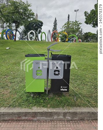 Cordoba, Argentina - April 11, 2026: Public recycling containers in a city park Cordoba, Argentina - April 11, 2026: Public recycling containers in a city park 140378379