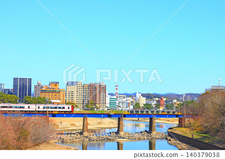 Okazaki City, Aichi Prefecture, scenery of the townscape of Okazaki City and Meitetsu train 140379038