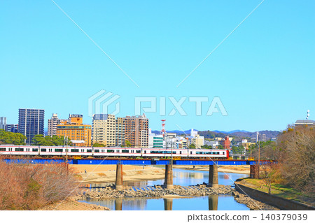 Okazaki City, Aichi Prefecture, scenery of the townscape of Okazaki City and Meitetsu train 140379039