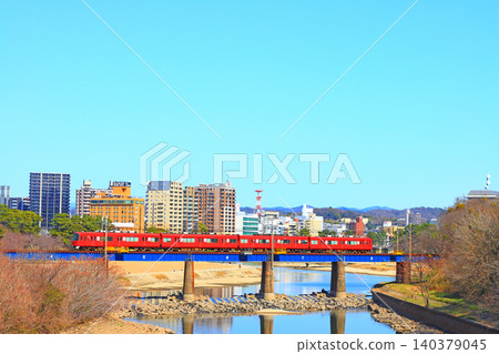 Okazaki City, Aichi Prefecture, scenery of the townscape of Okazaki City and Meitetsu train Okazaki City, Aichi Prefecture, scenery of the townscape of Okazaki City and Meitetsu train 140379045