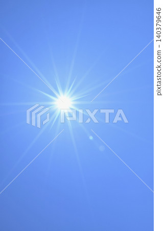 Blue sky and sun, direct sunlight, free space image 140379646