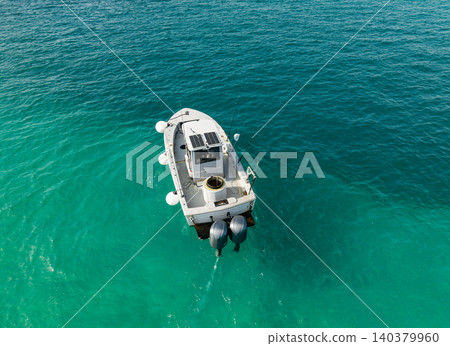 Vacation on summer. Summertime motorboat tour. Luxury motor boat yacht. Yacht go to marina. Boating and yachting. Luxury lifestyle. Marina yacht club aerial view. Yacht luxury view at sea Vacation on summer. Summertime motorboat tour. Luxury motor boat yacht. Yacht go to marina. Boating and yachting. Luxury lifestyle. Marina yacht club aerial view. Yacht luxury view at sea 140379960
