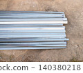 Stack Of Steel Square Pipes On Ground 140380218