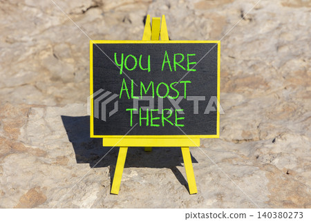 You are almost there words symbol. Concept words You are almost there on beautiful black blackboard. Beautiful stone background. Business You are almost there motivational support concept. Copy space. You are almost there words symbol. Concept words You are almost there on beautiful black blackboard. Beautiful stone background. Business You are almost there motivational support concept. Copy space. 140380273