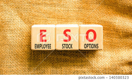 ESO employee stock options symbol. Concept words ESO employee stock options on beautiful wooden blocks. Beautiful canvas background. Business ESO employee stock options concept. Copy space. 140380323