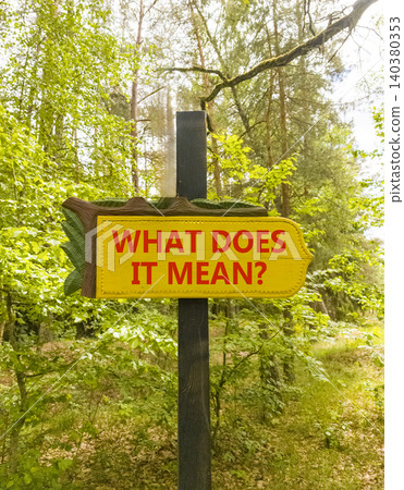 What does it mean words symbol. Concept words What does it mean on beautiful yellow road sign. Beautiful green forest background. Business What does it mean motivational support concept. Copy space. What does it mean words symbol. Concept words What does it mean on beautiful yellow road sign. Beautiful green forest background. Business What does it mean motivational support concept. Copy space. 140380353