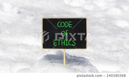 Code of ethics words symbol. Concept words Code of ethics on beautiful black blackboard. Beautiful white snow background. Business Code of ethics concept. Copy space. Code of ethics words symbol. Concept words Code of ethics on beautiful black blackboard. Beautiful white snow background. Business Code of ethics concept. Copy space. 140380366