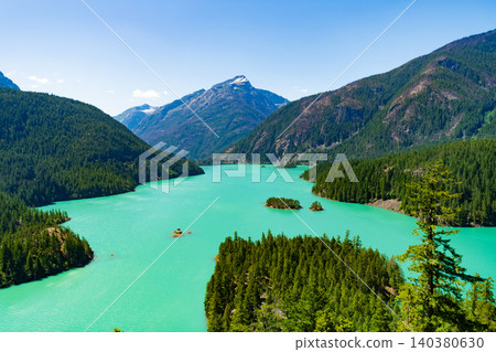 Diablo lake with mountain landscape. Landscape of mountain peak and Diablo lake. Nature landscape. Diablo Lake in North Cascades National Park. Scenic nature view at Diablo lake. Nature miracle 140380630