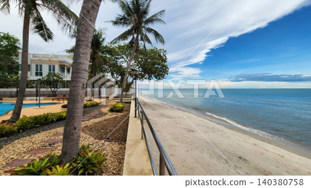 Luxury Beachfront Resort Villa with Swimming Pool and Palm Trees at Tropical Beach Luxury Beachfront Resort Villa with Swimming Pool and Palm Trees at Tropical Beach 140380758