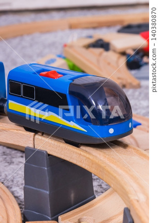 Toy tracks and train for play of children. Child development and happy childhood Toy tracks and train for play of children. Child development and happy childhood 140380870