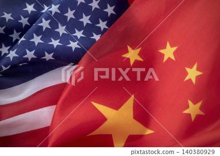Flags of the United States and China together. Concept of geopolitical tension between the two countries. International relations. political negotiation Flags of the United States and China together. Concept of geopolitical tension between the two countries. International relations. political negotiation 140380929